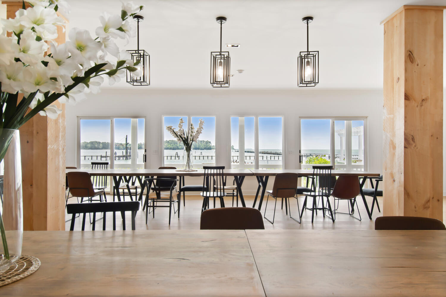 The dining room — long table for indoor meals, the cake, the toasts